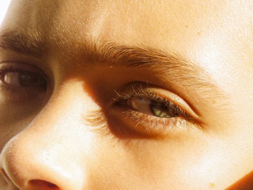 a close up of a person with a cell phone